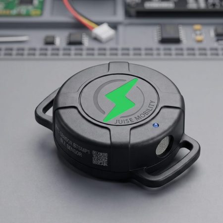 Close-up of a Juise thermal monitoring sensor on a workbench